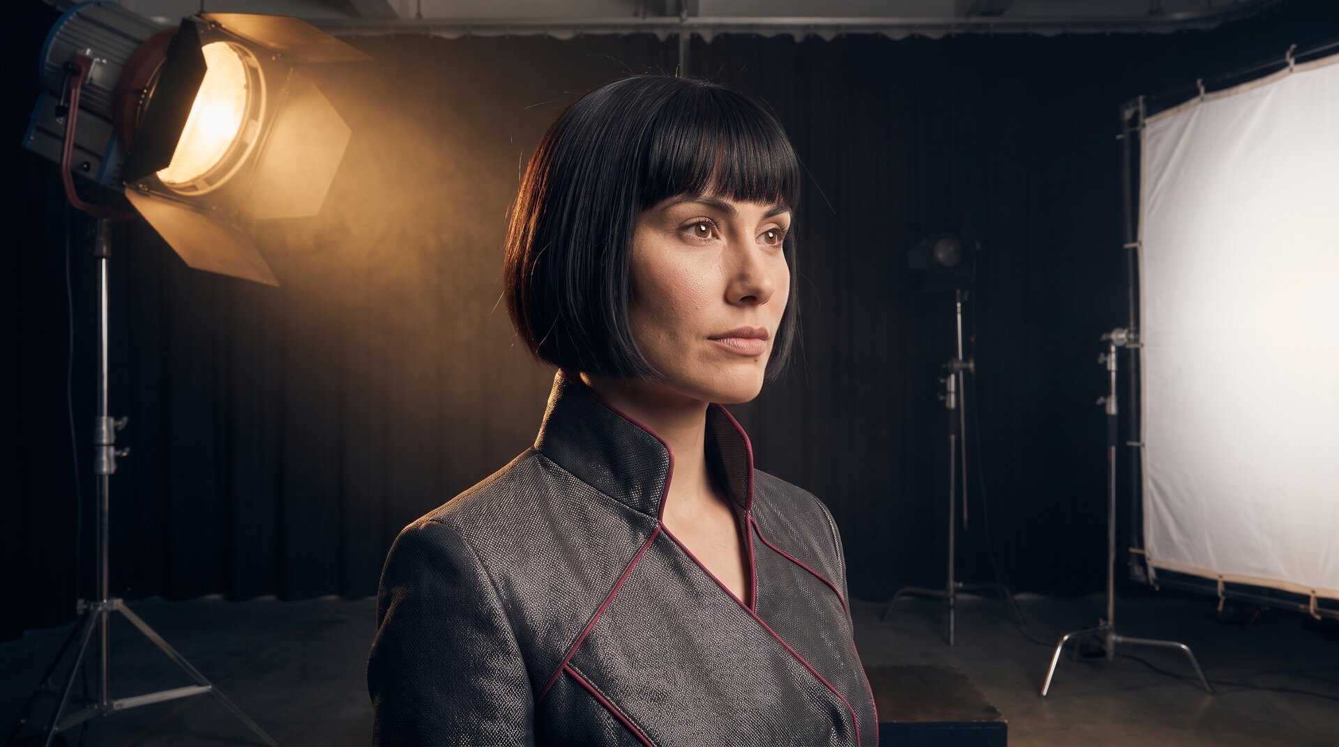 AI influencer on a dark studio stage